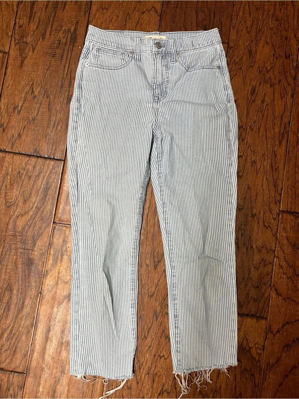Madewell railroad striped 10” high rise skinny crop jeans with raw hem